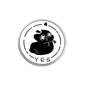 Circular metal enamel brooch featuring a mysterious game character and YES text detail