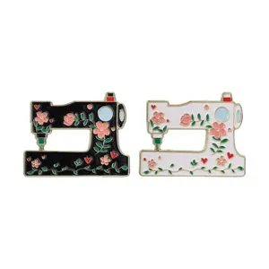 Set of retro floral sewing machine brooches in black and white enamel
