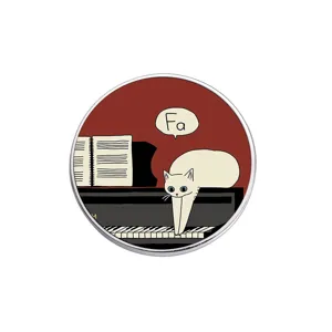 Whimsical white cat on piano enamel pin with "Fa" music note speech bubble badge.