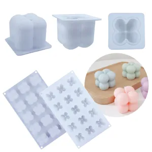 Silicone bubble candle mold and 3D cube mold for DIY aromatherapy wax and handmade craft details.