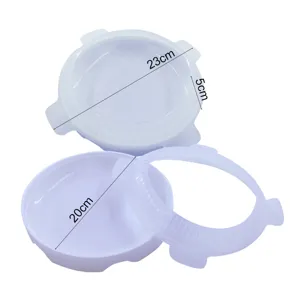 Detailed view of milky white silicone cake mold with 23cm and 20cm diameter measurements