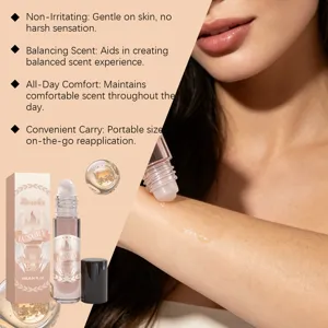 Huile parfumée roll-on portable au parfum longue durée, douce et respectueuse de la peau.