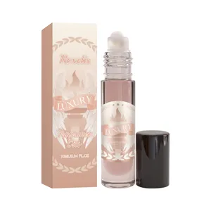 Flacon d'huile de parfum roll-on portable avec boîte élégante, parfum d'ambre doux.