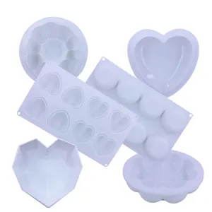 White silicone baking molds set for DIY cakes, mousse, and heart-shaped pastries.