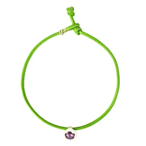 Green leather cord choker necklace with a purple flower-shaped gemstone pendant