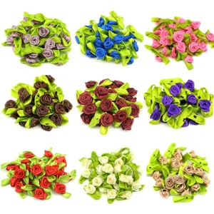 Detailed view of mini ribbon satin rose flowers in multiple colors for DIY crafts