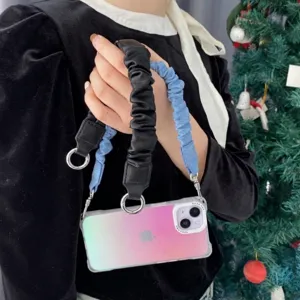 Detailansicht von Telefon-Handgelenkschlaufen aus schwarzem Leder und blauem Stoff