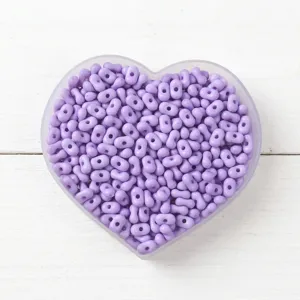 Solid purple candy color peanut-shaped double-hole beads in a heart-shaped tray