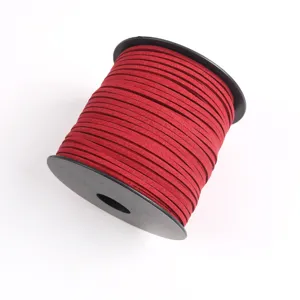 Red faux suede cord detail shot, soft microfiber string for DIY jewelry making and craft projects.