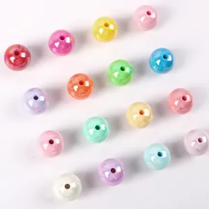 Macro detail of colorful AB coated acrylic round beads for DIY jewelry and phone chains.