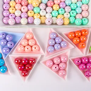 Detail view of colorful macaron AB acrylic round beads for DIY jewelry and phone chains