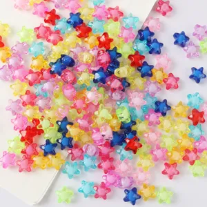 Macro shot of colorful 11mm acrylic star-shaped loose beads for jewelry DIY.