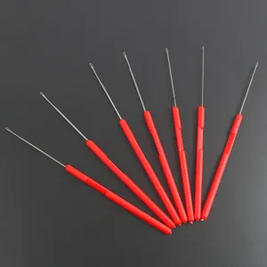 Detail view of 6-piece red handle bead stringing wire loop needles for jewelry craft DIY.