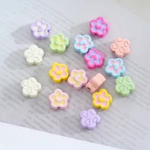 Colorful alloy flower heart beads detail shot, perfect for DIY phone charms and jewelry making.