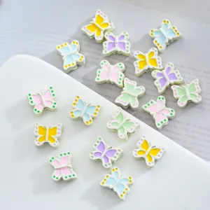 Colorful alloy enamel butterfly charm beads for DIY phone chains, necklaces, and jewelry details.