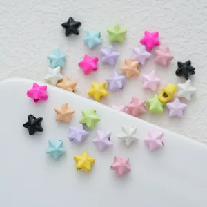 Colorful star alloy beads close-up, ideal for DIY phone charms, necklaces, and keychains crafting.