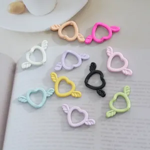 Alloy heart wing charm beads for DIY phone chains, keychains, and handmade jewelry making.
