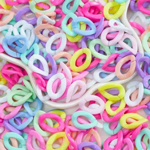 Colorful acrylic open jump rings DIY craft accessories detail view, vibrant pastel link chains.