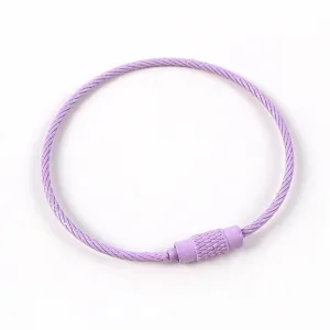 Close-up of purple painted steel wire loop, metal DIY keychain ring accessory 50mm.