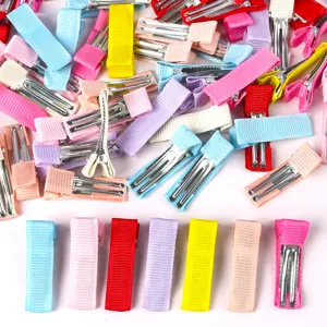 Vue détaillée de pinces à cheveux crocodiles en ruban coloré pour accessoires de cheveux DIY