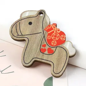Wooden horse-shaped pendant with lucky money bag design for DIY jewelry and keychains.