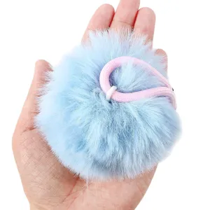 Fluffy blue faux fur pom pom keychain charm with pink strap DIY bag pendant accessories.