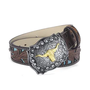 Ceinture en cuir gaufré vintage cow-boy de l'Ouest avec boucle de tête de taureau ornée.