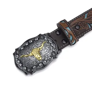 Ceinture cowboy western vintage avec boucle métal tête de taureau et cuir gaufré floral.