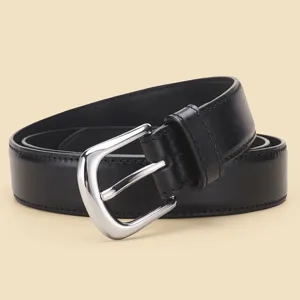 Black leather belt detail with silver buckle, minimalist design for casual and formal wear.