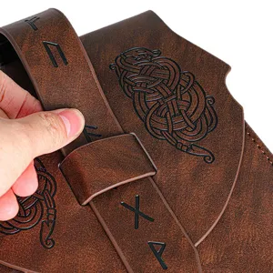 Detailed view of Viking style leather waist bag with Norse runes and knotwork