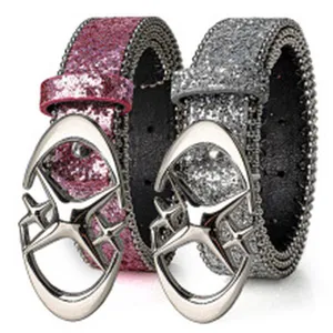 Close-up view showing the shimmering glitter texture and star-design buckles on belts