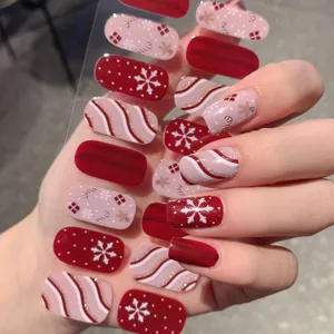 Festliche Weihnachts-Nagelsticker mit Schneeflocken-, Zuckerstangen- und Lebkuchen-Motiven