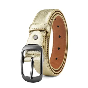 Close-up detail of the metallic gun black oval buckle and golden textured leather belt strap.