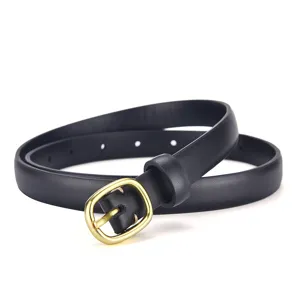 Close-up detail of the black women leather belt featuring a classic gold metal pin buckle.