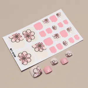 Detailed view of spring flower toenail stickers in pink and beige with 22 pieces