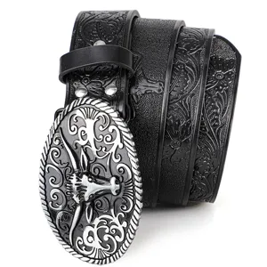 Detailed closeup of mens vintage leather belt featuring ornate bull head metal buckle.