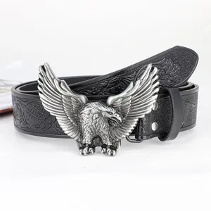 Cintura in pelle da uomo vintage con cinturino floreale e fibbia ad aquila argentata.