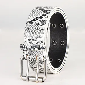 Detail view of a stylish black and white snakeskin pattern belt with double prong buckle.