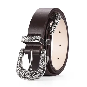 Close-up of vintage brown leather belt with ornate silver-tone double buckles