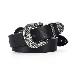 Detailed view of black vintage Western belt featuring ornate engraved silver-toned metal buckle