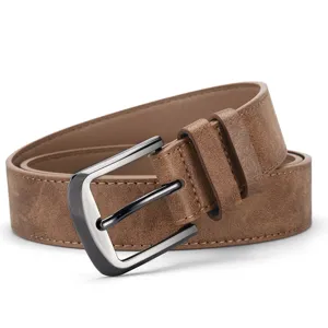 Close-up detail of a vintage brown PU leather belt featuring a silver metal pin buckle