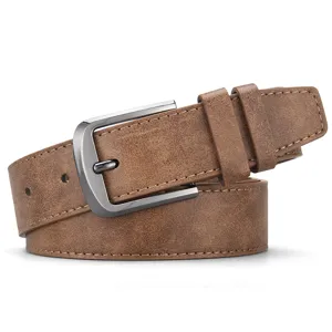 Close-up of vintage brown PU leather men's belt with gunmetal pin buckle and stitching