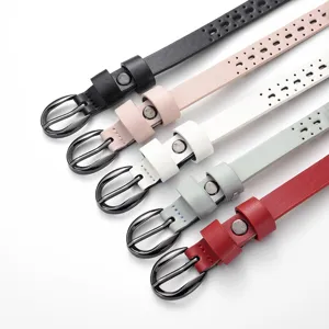 Close-up of five colorful thin leather belts for women with pin buckle and hollow design