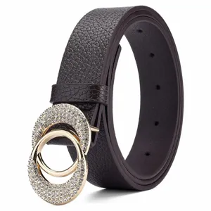 Close-up detail of stylish women leather belt featuring a sparkling rhinestone double ring buckle