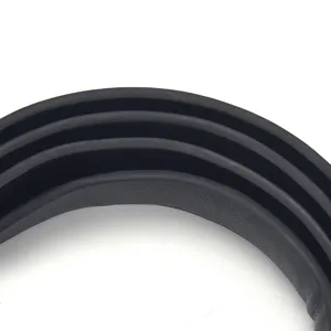 Close-up detail of a minimalist black thin leather belt showing its smooth texture