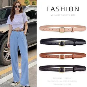 Versatile women's slim leather belt with elegant gold pin buckle for dresses and jeans.