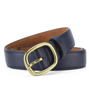 Detail view of a stylish dark blue leather women belt with vintage brass pin buckle casual.