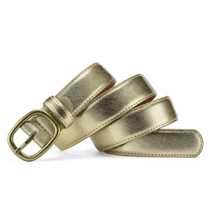 Gold womens belt detail closeup, classic pin buckle design, stylish accessory for daily wear.