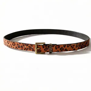 Detail view of a leopard print belt featuring a vintage gold buckle and D.SIGN hardware.