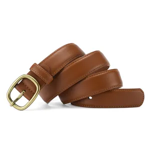 Brown leather belt closeup detail showing quality metal buckle and fine stitching craftsmanship.